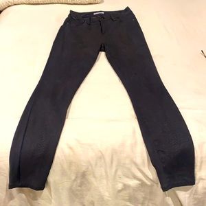 Good American Black skinny ankle jeans.